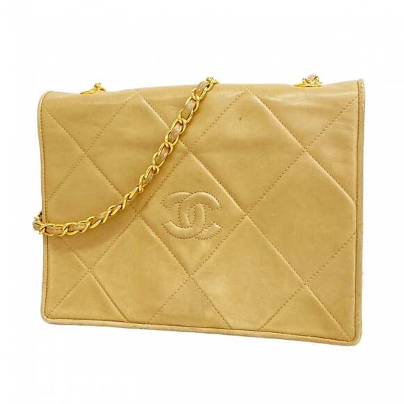 CHANEL Handbags - CHANEL Cream Lambskin Leather Shoulder Bag